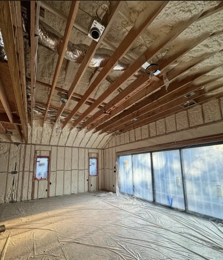 Interior walls and ceiling insulated with spray foam during new construction in Cushing